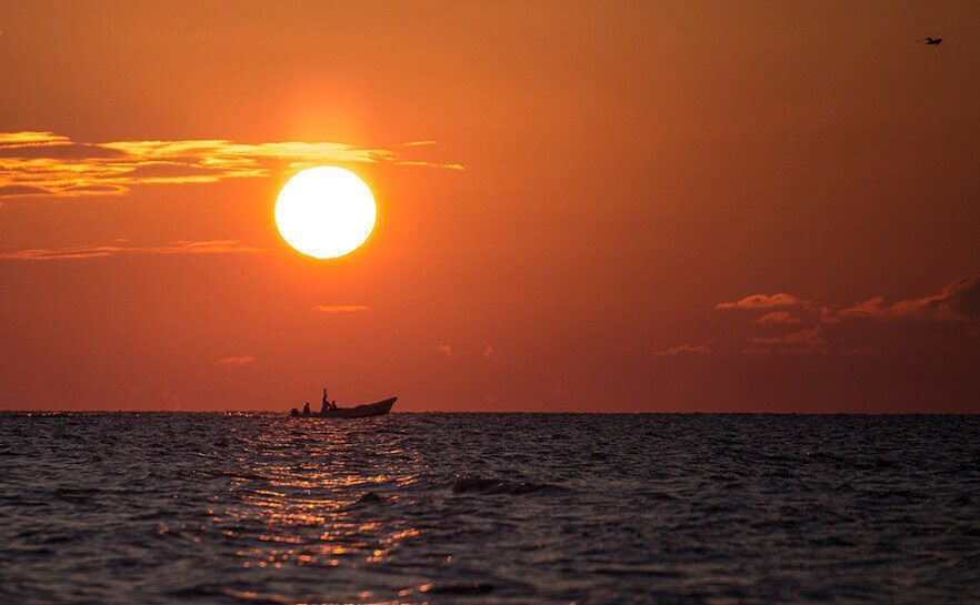 Holbox sunset scene - TravelBreak