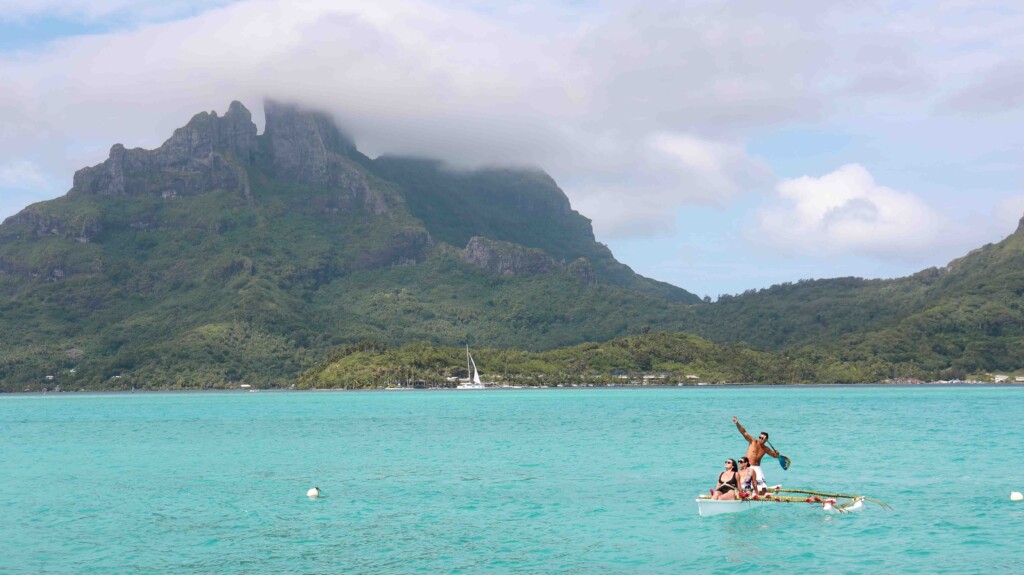 canoeing in the water at the St Regis Bora Bora Resort - best things to do in Bora Bora